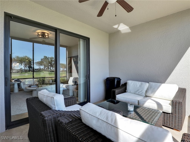 view of patio / terrace with a balcony, outdoor lounge area, and ceiling fan