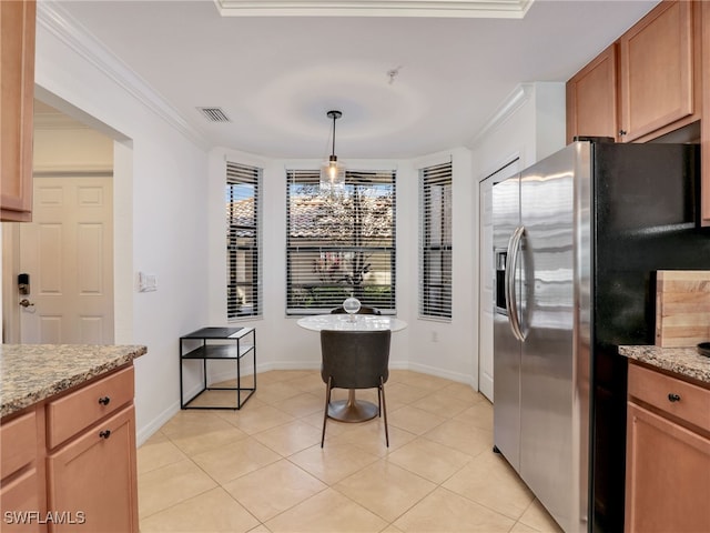 kitchen featuring light tile patterned floors, visible vents, ornamental molding, and stainless steel fridge with ice dispenser