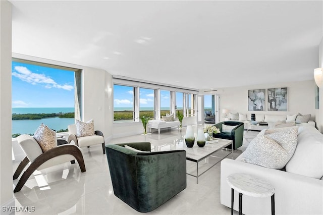 living area with a wall of windows and a water view