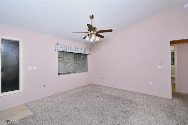 carpeted empty room with ceiling fan