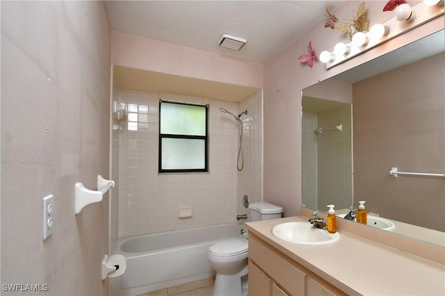 full bathroom with tile patterned flooring, visible vents, tub / shower combination, toilet, and vanity