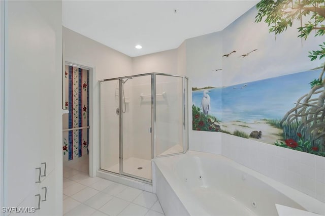 bathroom featuring a stall shower, tile patterned floors, and a tub with jets