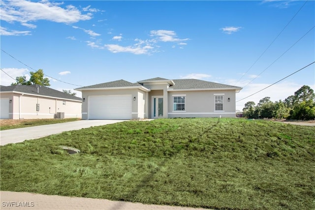 view of front of home with driveway, a garage, central AC, stucco siding, and a front lawn