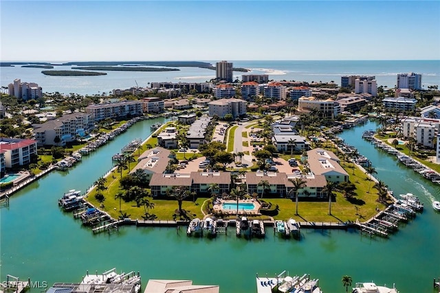 bird's eye view featuring a view of city and a water view