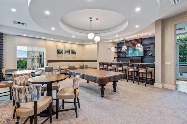 recreation room featuring a tray ceiling, visible vents, carpet floors, and recessed lighting