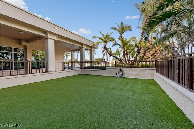 view of yard featuring fence