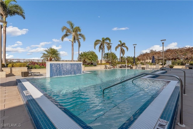 pool featuring a patio area