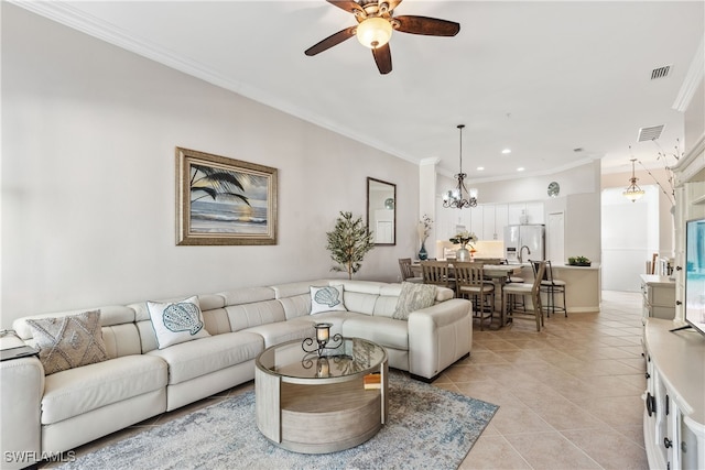 living room featuring light tile patterned flooring, ceiling fan with notable chandelier, visible vents, and ornamental molding