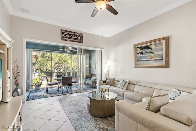 living area featuring light tile patterned floors, visible vents, a ceiling fan, and crown molding