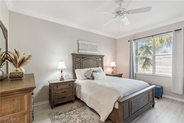 bedroom with ceiling fan, light wood-style flooring, baseboards, and ornamental molding