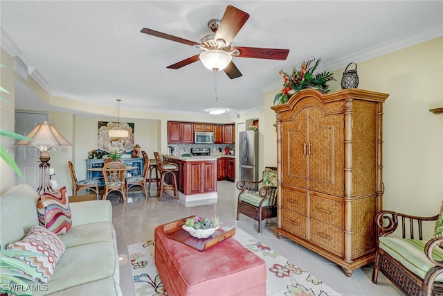 living area with crown molding, light tile patterned floors, and ceiling fan