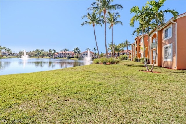 view of yard with a water view