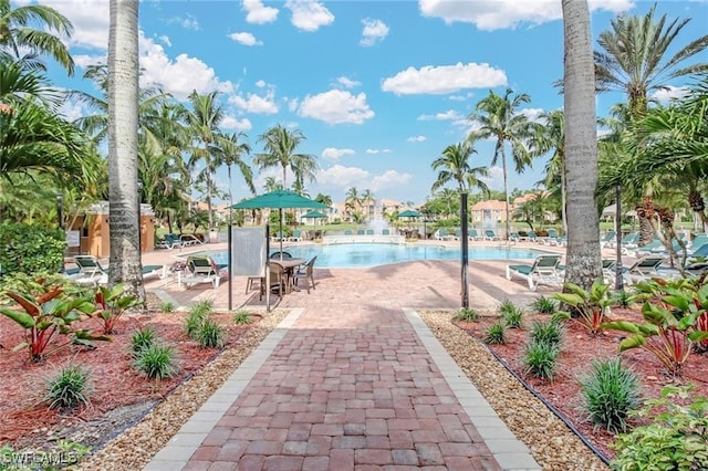 pool with a patio area