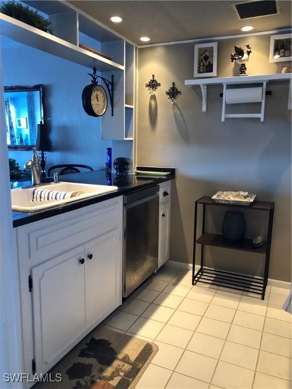 kitchen with visible vents, a sink, light tile patterned floors, stainless steel dishwasher, and open shelves