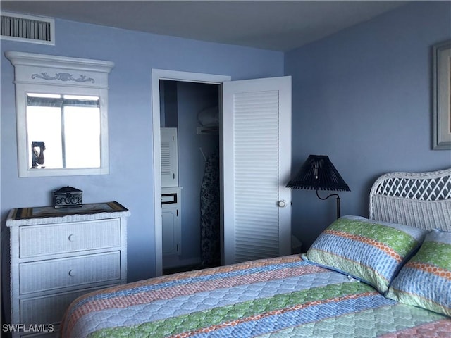 bedroom with visible vents