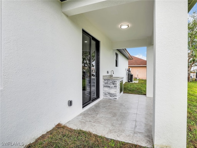 view of patio with central air condition unit