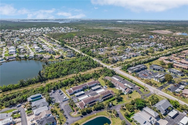 aerial view featuring a residential view and a water view