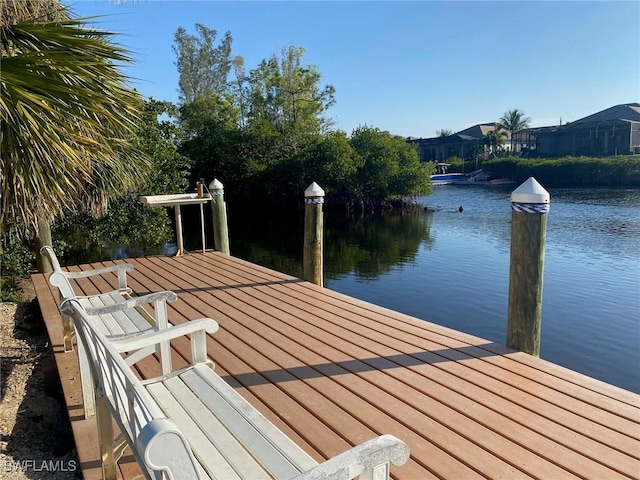 view of dock with a water view