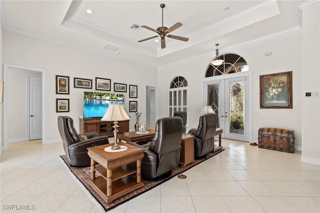 2874 Lone Pine Ln, Naples, FL 34119 - living room with visible vents, light tile patterned flooring, baseboards, ceiling fan, and a tray ceiling