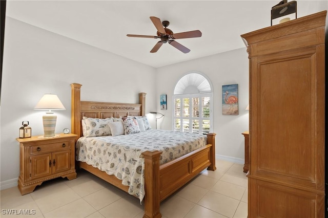 2874 Lone Pine Ln, Naples, FL 34119 - bedroom with light tile patterned flooring, baseboards, and ceiling fan