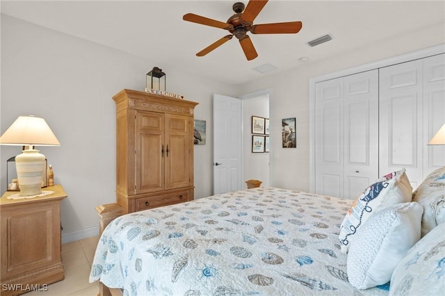 2874 Lone Pine Ln, Naples, FL 34119 - bedroom with a ceiling fan, visible vents, light tile patterned floors, baseboards, and a closet