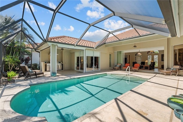 2874 Lone Pine Ln, Naples, FL 34119 - outdoor pool with a patio, ceiling fan, and glass enclosure