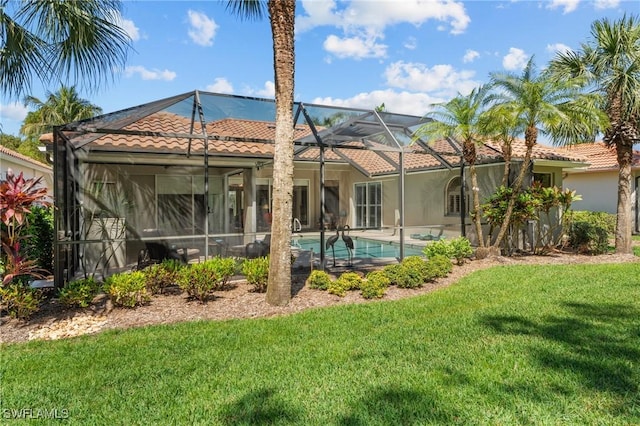 2874 Lone Pine Ln, Naples, FL 34119 - back of property with a tile roof, stucco siding, an outdoor pool, glass enclosure, and a yard