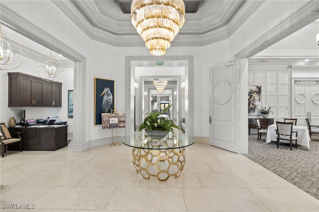 2874 Lone Pine Ln, Naples, FL 34119 - foyer entrance with crown molding, a high ceiling, a notable chandelier, and baseboards