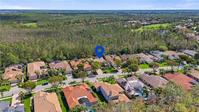 2874 Lone Pine Ln, Naples, FL 34119 - birds eye view of property with a view of trees and a residential view