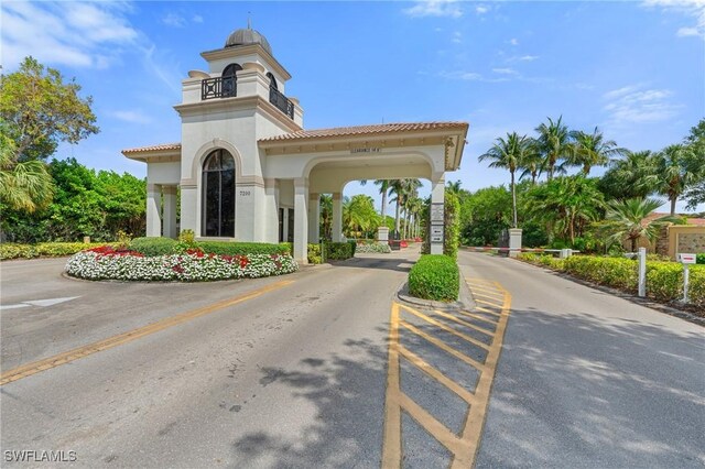 2874 Lone Pine Ln, Naples, FL 34119 - exterior space featuring a gated entry