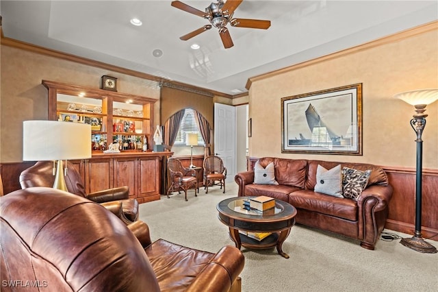9330 Triana Ter Unit 274, Fort Myers, FL 33912 - living area with carpet floors, a ceiling fan, wainscoting, a dry bar, and ornamental molding