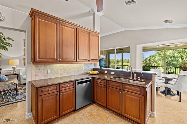 9330 Triana Ter Unit 274, Fort Myers, FL 33912 - kitchen featuring a sink, dishwasher, a peninsula, visible vents, and decorative backsplash