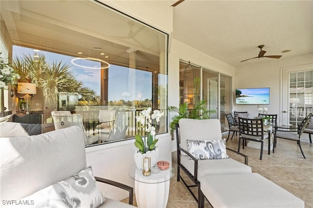 9330 Triana Ter Unit 274, Fort Myers, FL 33912 - view of patio / terrace with outdoor lounge area and ceiling fan