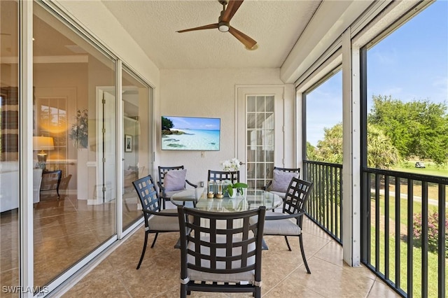 9330 Triana Ter Unit 274, Fort Myers, FL 33912 - sunroom featuring a textured ceiling, ceiling fan, and tile patterned floors