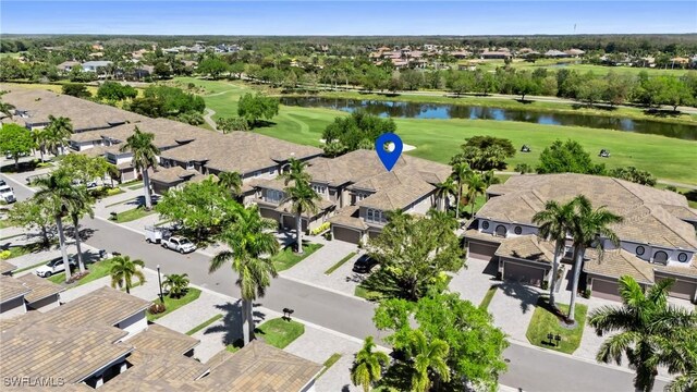 9330 Triana Ter Unit 274, Fort Myers, FL 33912 - bird's eye view featuring view of golf course, a residential view, and a water view