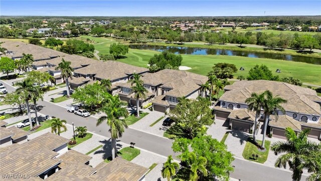 9330 Triana Ter Unit 274, Fort Myers, FL 33912 - drone / aerial view featuring view of golf course, a residential view, and a water view