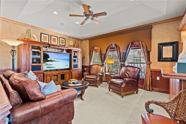 9330 Triana Ter Unit 274, Fort Myers, FL 33912 - carpeted living area with a ceiling fan, a wainscoted wall, a tray ceiling, and crown molding