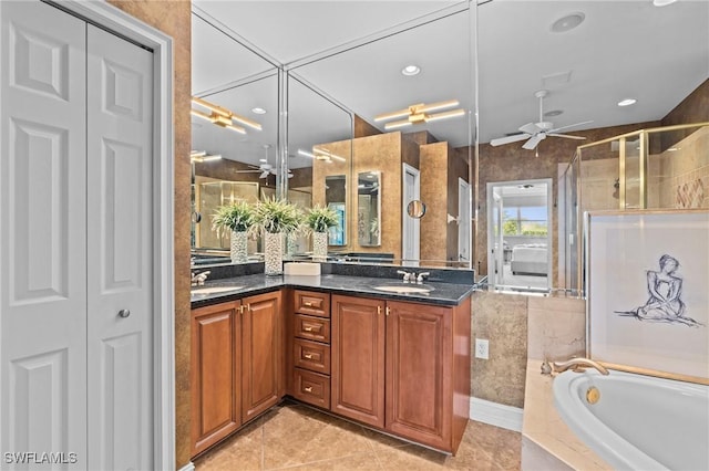 9330 Triana Ter Unit 274, Fort Myers, FL 33912 - bathroom with a stall shower, double vanity, ceiling fan, and a sink
