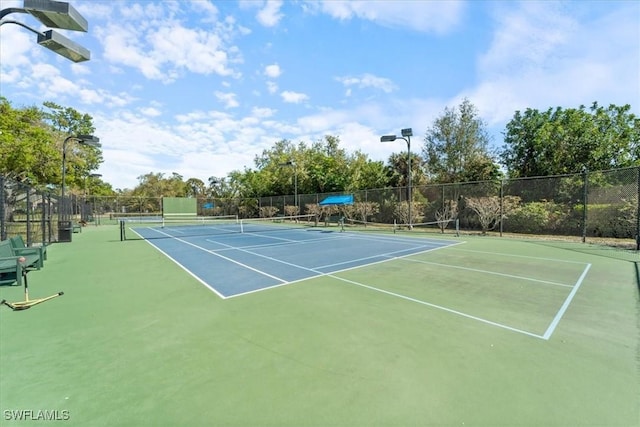 view of sport court with community basketball court and fence