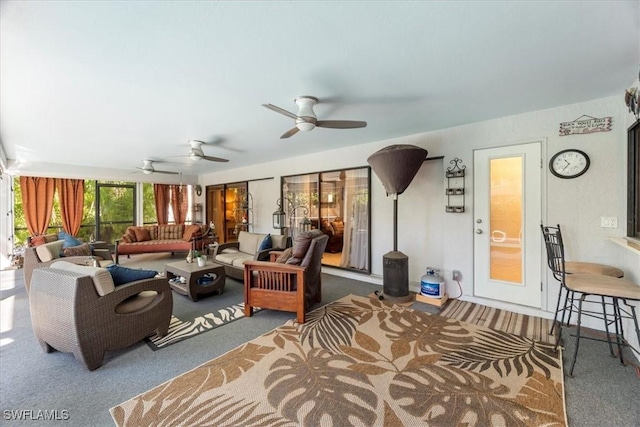 living area featuring ceiling fan