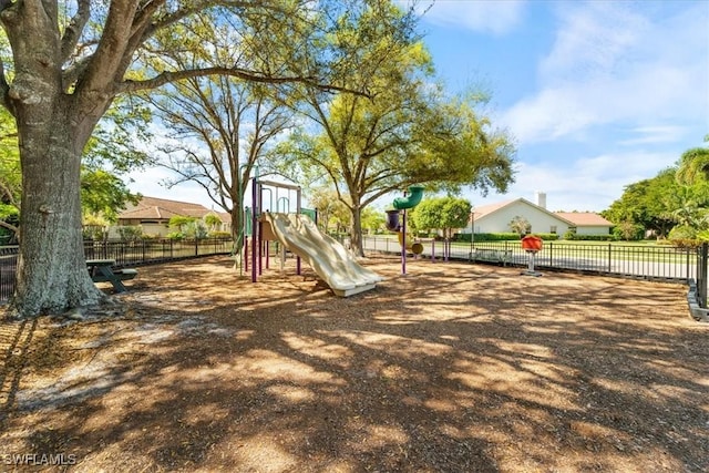 community playground featuring fence