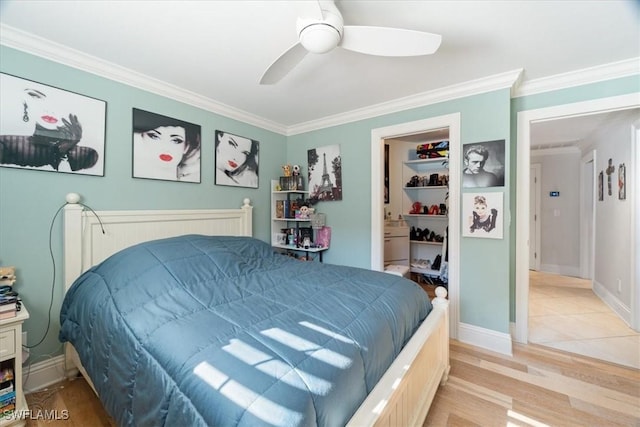 bedroom featuring ceiling fan, baseboards, light wood-style floors, and ornamental molding