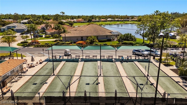 bird's eye view with a residential view and a water view