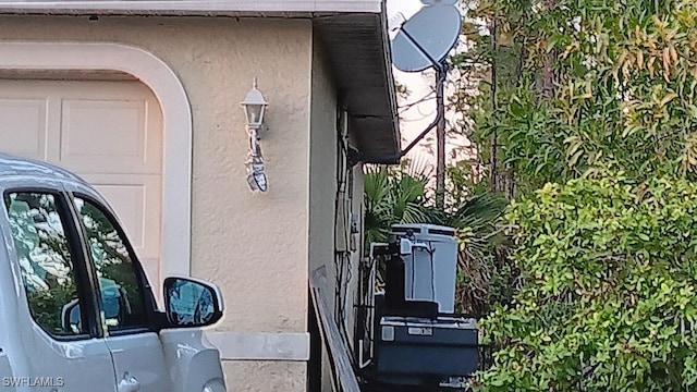 details featuring arched walkways and stucco siding