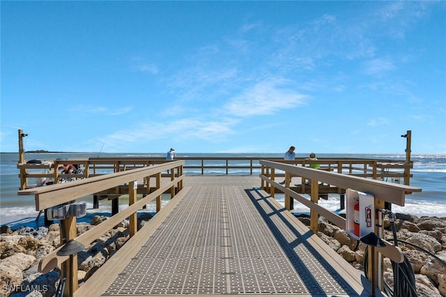 view of dock with a water view