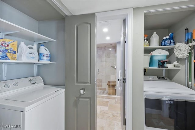 laundry area featuring washer and dryer and laundry area