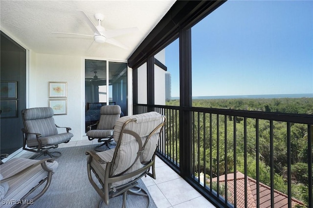 exterior space featuring ceiling fan