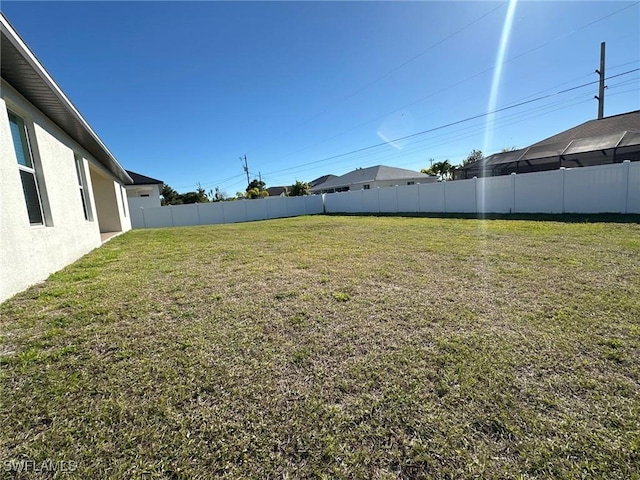 view of yard featuring fence