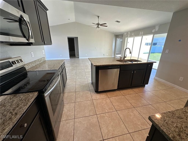 kitchen with a sink, ceiling fan, light tile patterned floors, and stainless steel appliances