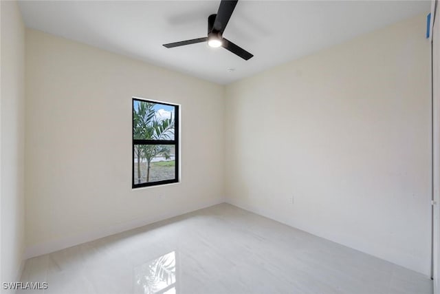 spare room featuring ceiling fan